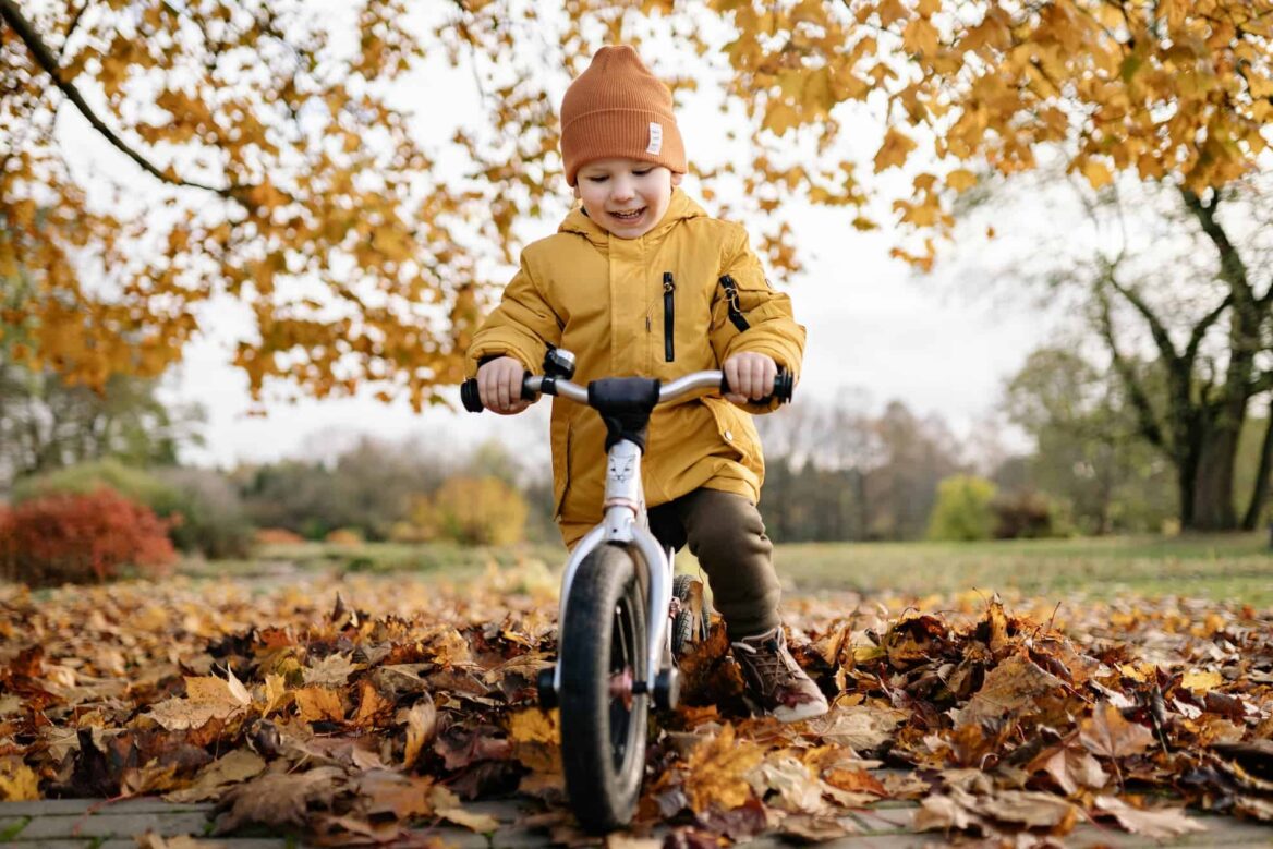 kid riding bike in neighborhood